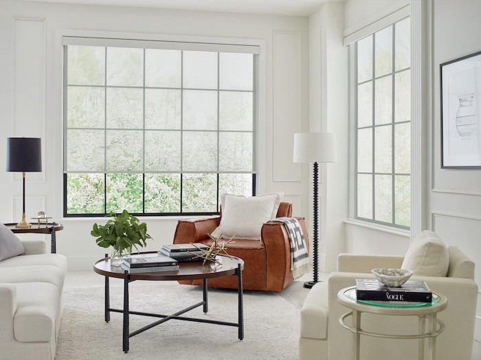 A living room with relaxed furniture and soft lighting.